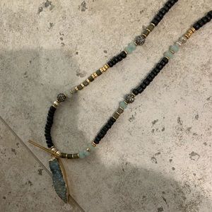 Black, blue, and gold long necklace